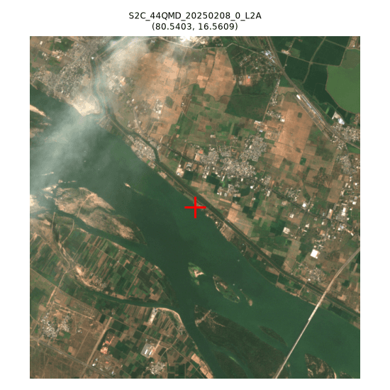 point sits in open river water with haze/smoke visible upper-left, no exposed sediment at this exact point